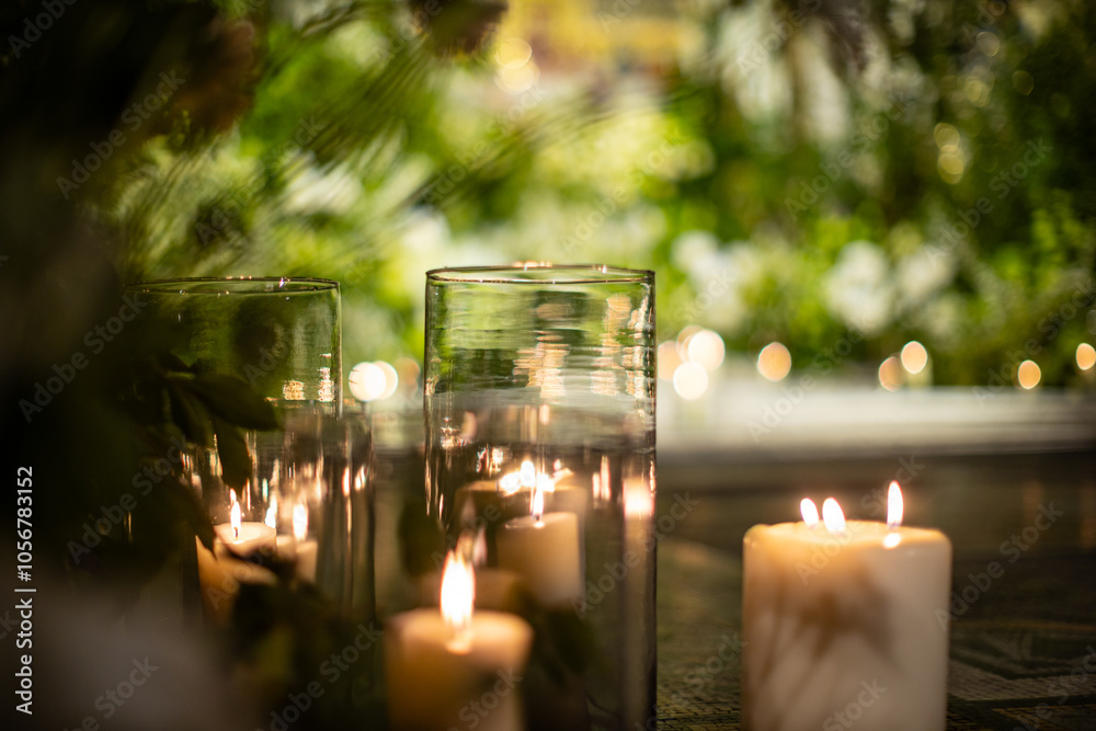 Candlelit Glass Votives with Greenery in Cozy Ambiance Candlelit Glass Votives with Greenery in Cozy Ambiance