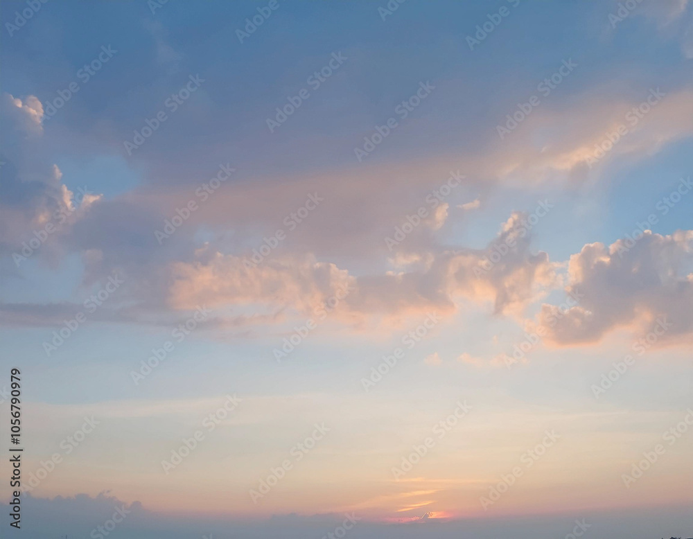 Fototapeta premium Golden Sunrise A Sky Adorned with Clouds on a Bright Morning