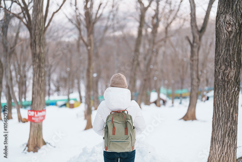 Woman tourist with snow in winter season at Zao fox village, traveler sightseeing Miyagi prefecture. landmark and popular for attraction near Sendai, Tohoku, Japan. Travel and Vacation photo