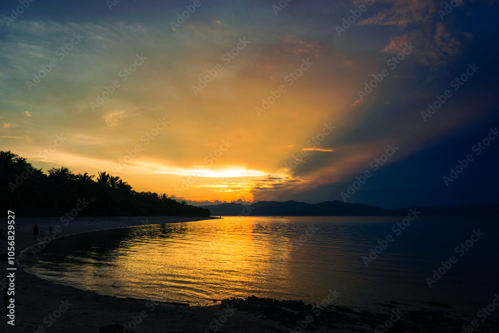Majestic golden sunset at sea. Bonbon Beach, Romblon Island, Philippines Majestic golden sunset at sea. Bonbon Beach, Romblon Island, Philippines