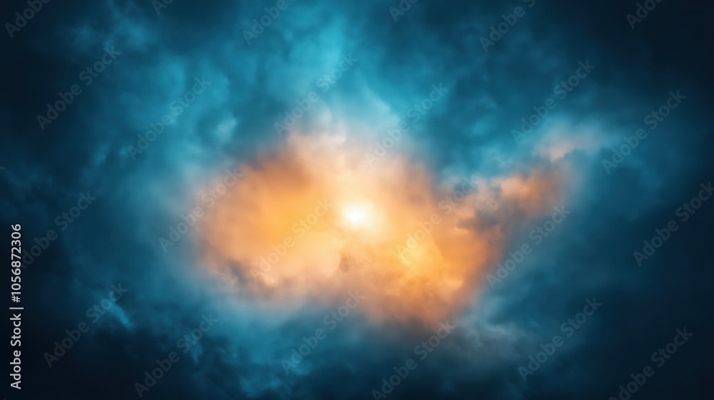 Fototapeta premium Dramatic sky with vibrant orange light breaking through blue storm clouds, creating a mystical and dynamic atmosphere.