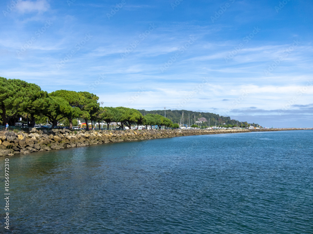 Panoramic view of the seaside promenade in the tourist town of Hondarribia on a sunny summer day in the Basque Country. Panoramic view of the seaside promenade in the tourist town of Hondarribia on a sunny summer day in the Basque Country.