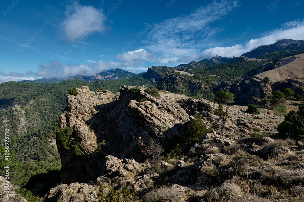 Stunning rocky mountain landscape under a clear blue sky Stunning rocky mountain landscape under a clear blue sky