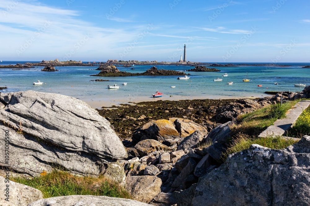 Picturesque coastal scene with crystal-clear turquoise waters surrounded by rocky islets. Picturesque coastal scene with crystal-clear turquoise waters surrounded by rocky islets.