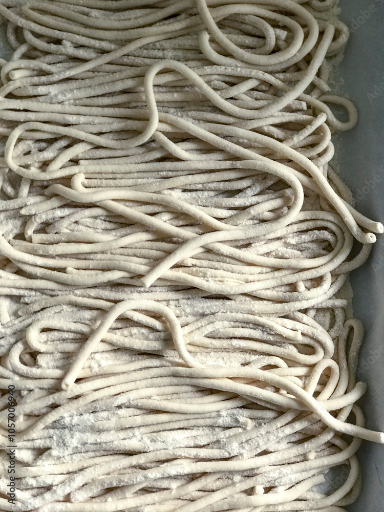 Freshly Made Noodles Are Carefully Spread Out for Preparation in the Kitchen for Cooking Freshly Made Noodles Are Carefully Spread Out for Preparation in the Kitchen for Cooking