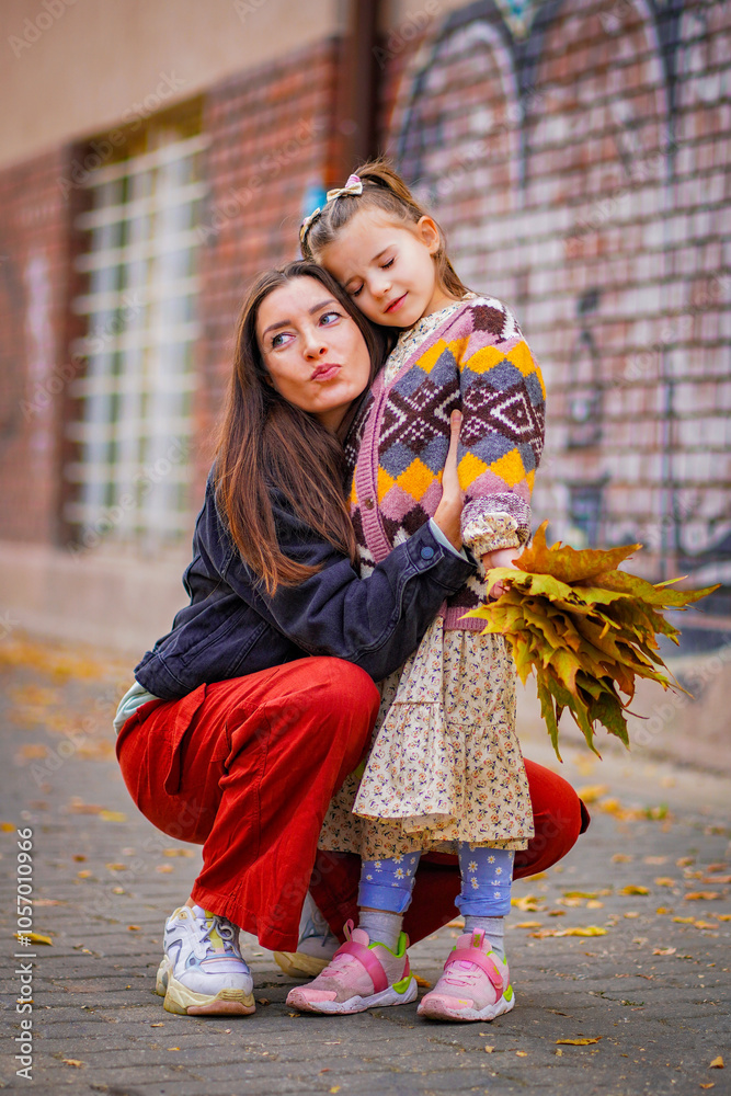 Fototapeta premium portrait of a woman with her child in romania 