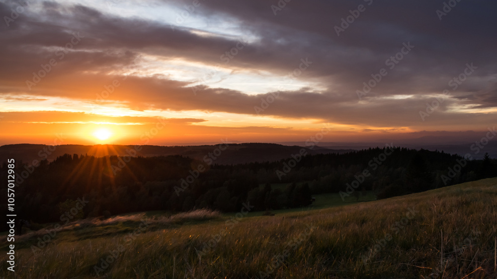 Sunset from Panský kopec in the Orlické Mountains and a view of the Czech landscape. Sunset from Panský kopec in the Orlické Mountains and a view of the Czech landscape.