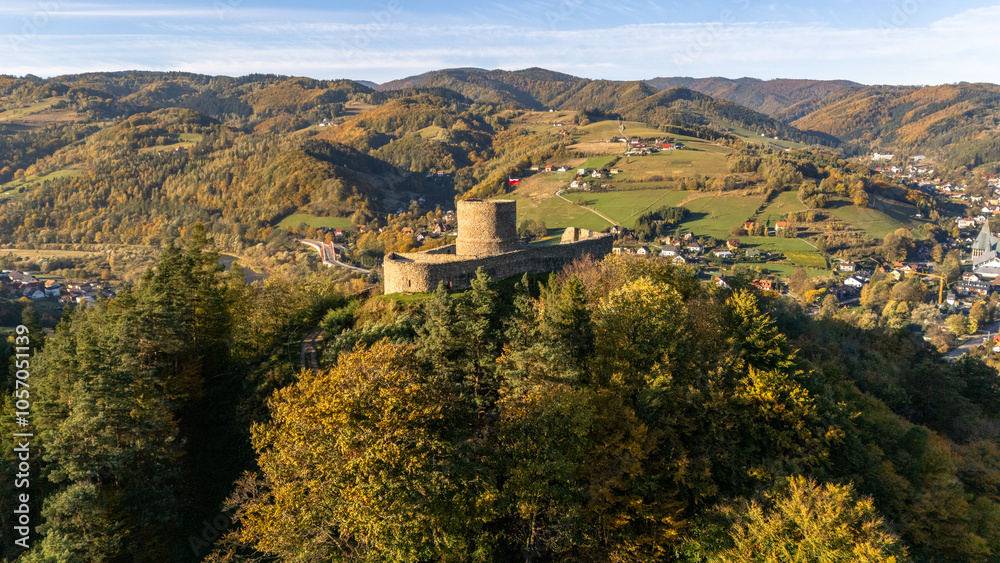 aerial view of a castle in the mountains of Poland in autumn at sunset aerial view of a castle in the mountains of Poland in autumn at sunset