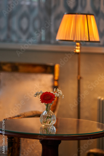 Splendid chandelier with lit candles in a beautiful room of an old mansion