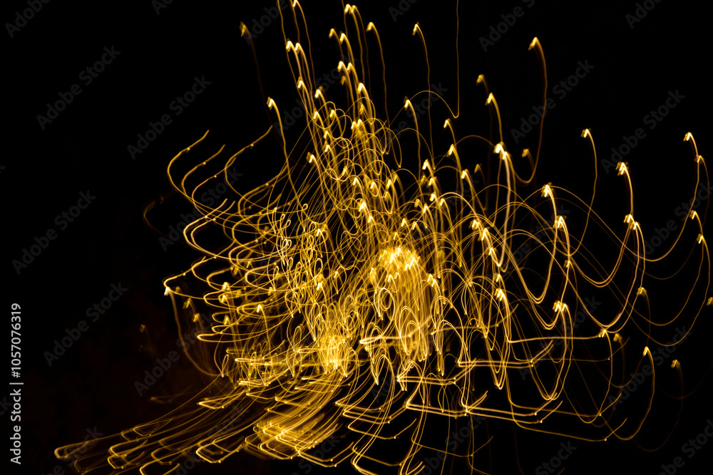 malowane światłem, obraz świetlny z wzorami i kształtami, abstrakcyjna fotografia z poruszającymi się światłami, Blurred Light painting, żółte maziaje świetlne, light painting photography, abstarct
