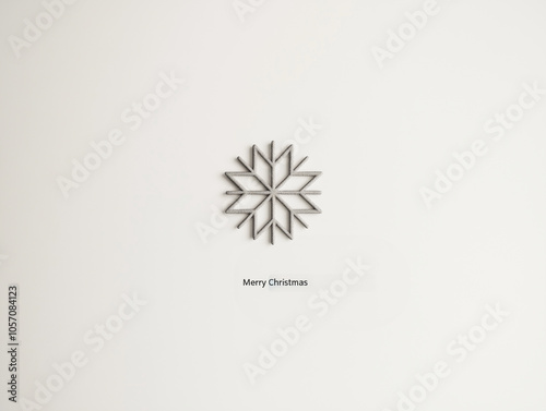 A minimalistic Christmas poster design featuring a single, stylized snowflake in the center of a plain white background