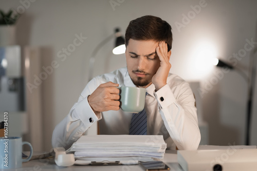 Stressed businessman with c...