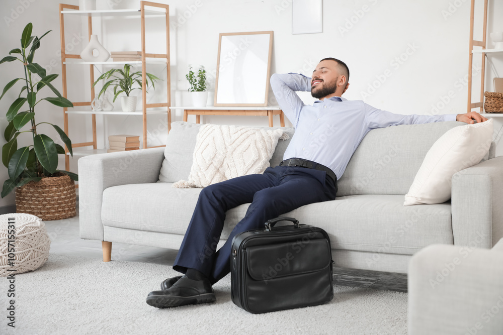 Young businessman resting on his day off at home Young businessman resting on his day off at home
