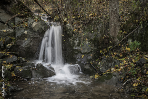 Close up view of a blurry waterfall.