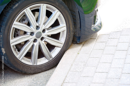 Tableau sur toile Car tire with bulging sidewall from impact with curb