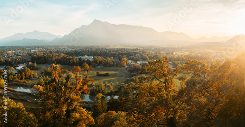 Obraz na płótnie Beautiful panoramic view of yellow fall scenery in Salzburg with Untersberg mountain in golden evening light at sunset, Austria w salonie