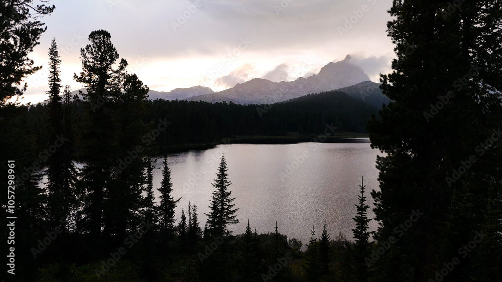 the lake is Bright at sunset, filmed from a drone the lake is Bright at sunset, filmed from a drone