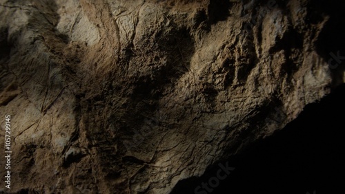 Weathered rock surface with light shadow play