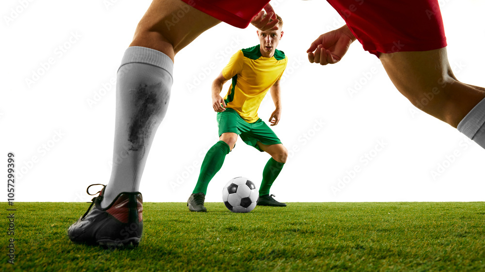 two soccer players in green and red uniforms struggling for ball possession, illustrating fierce energy and tension of game, on green soccer stadium. Concept of sport event, championship, motion. Ad two soccer players in green and red uniforms struggling for ball possession, illustrating fierce energy and tension of game, on green soccer stadium. Concept of sport event, championship, motion. Ad