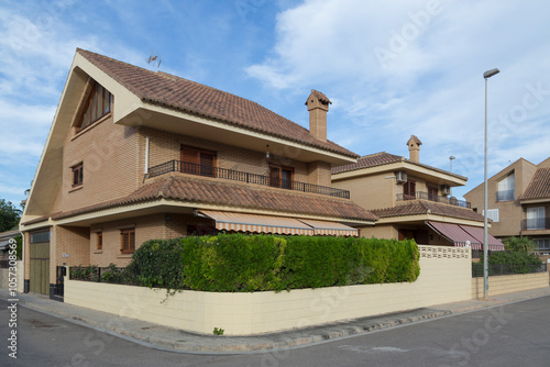 Detached house with awnings, two floors, view from the street, luxury villas in Sagunto, Valencia, Spain