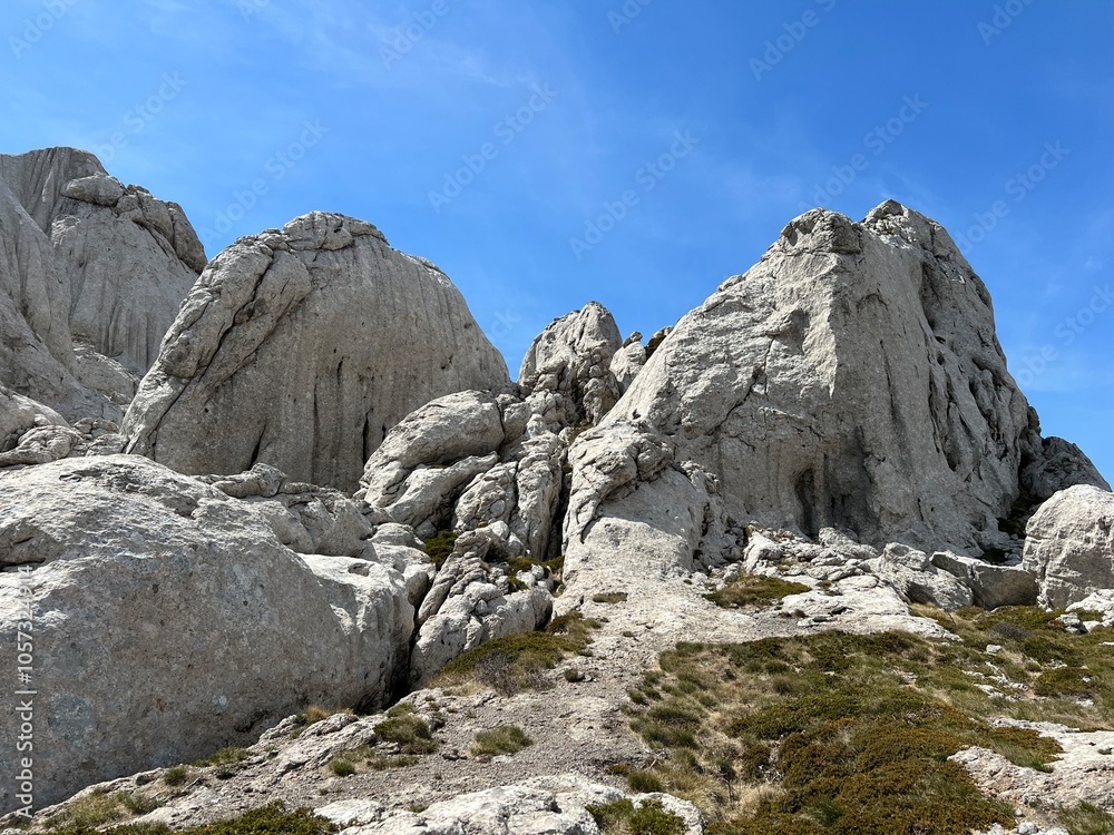 Rocky ridge of Tulove grede or karst mountain peak of Tulovice - Velebit Nature Park, Croatia (Stjenoviti greben Tulove grede ili krški planinski vrh Tulovice - Park prirode Velebit, Hrvatska) Rocky ridge of Tulove grede or karst mountain peak of Tulovice - Velebit Nature Park, Croatia (Stjenoviti greben Tulove grede ili krški planinski vrh Tulovice - Park prirode Velebit, Hrvatska)