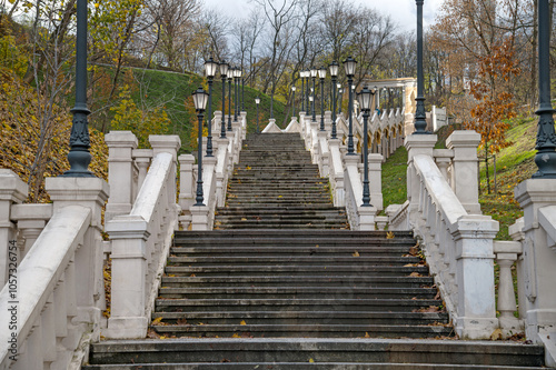 Cascade of stairs in the city park. Autumn view