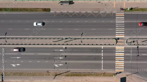 Top view of highway with cars passing along. Drone view of road traffic photo