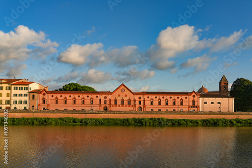 Summer sunset  landscape of Pisa old city and the embankment of Arno river, Italy, Europe