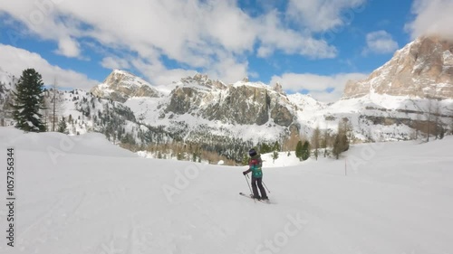 Amateur Female Skier Ski in Cortina D'ampezzo Ski Resort, Dolomites