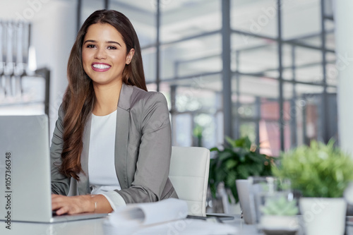 Accounting, typing or portrait of businesswoman on laptop for online research, fintech or profit evaluation. Face, happy or economist with technology for company revenue growth, report or investment