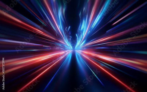 An abstract image of a city street at night with speeding cars creating streaks of light in red and blue.