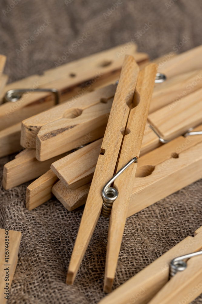 a group of wooden clothespins for drying clothes a group of wooden clothespins for drying clothes