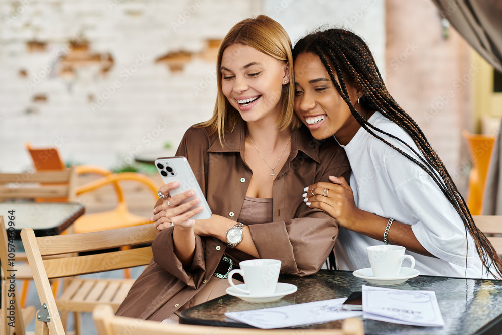 A happy couple enjoys each others company while sharing laughs over coffee at a cozy cafe A happy couple enjoys each others company while sharing laughs over coffee at a cozy cafe