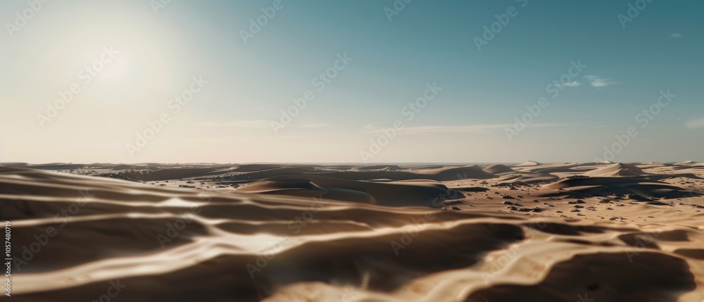 Serene golden dunes stretch endlessly under a clear blue sky, casting dynamic shadows in the soft desert light. Serene golden dunes stretch endlessly under a clear blue sky, casting dynamic shadows in the soft desert light.