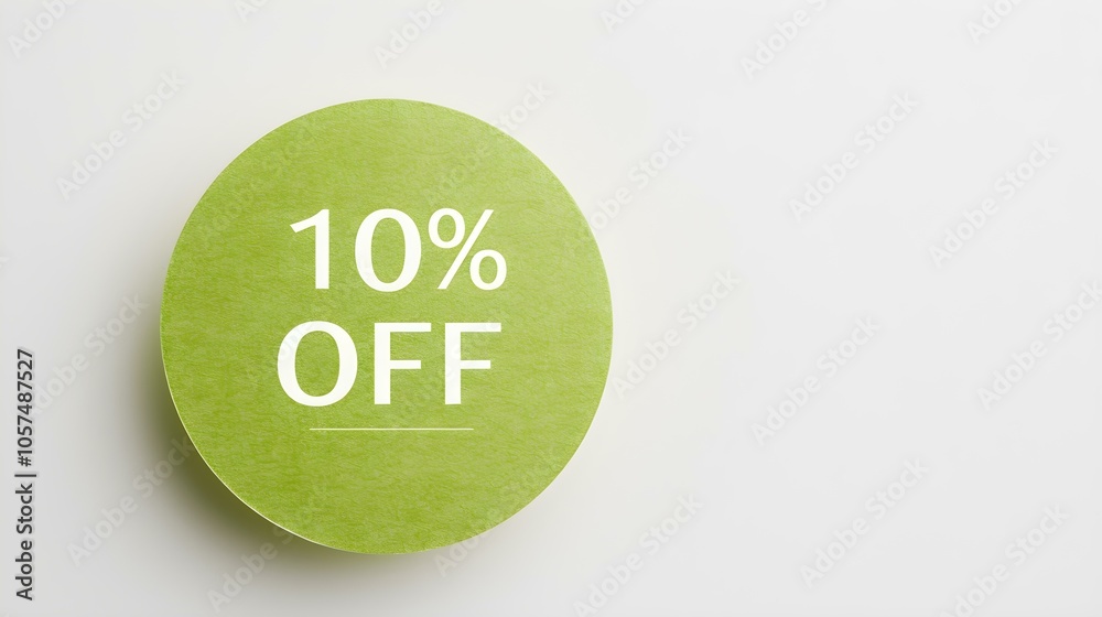 White '10% OFF' Text on a Green Round Paper Note. White Background with Copy Space White '10% OFF' Text on a Green Round Paper Note. White Background with Copy Space