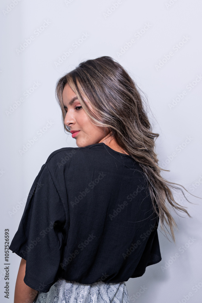 Young Hispanic, Latina, Peruvian woman in front of the camera playing with her hair, with different expressions
Young Hispanic, Latina, Peruvian woman in front of the camera playing with her hair, with different expressions