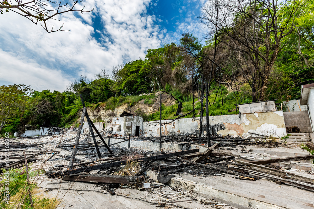 Burnt ruins and remains of building on fire. Varna, Black Sea, Bulgaria, boardwalk street perspective from the sea capital. Europe, EU Burnt ruins and remains of building on fire. Varna, Black Sea, Bulgaria, boardwalk street perspective from the sea capital. Europe, EU