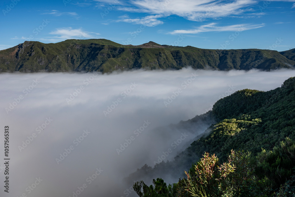 Cliffs and headlands above the clouds along the coast of Madeira, Portugal; Calheta, Madeira, Portugal Cliffs and headlands above the clouds along the coast of Madeira, Portugal; Calheta, Madeira, Portugal