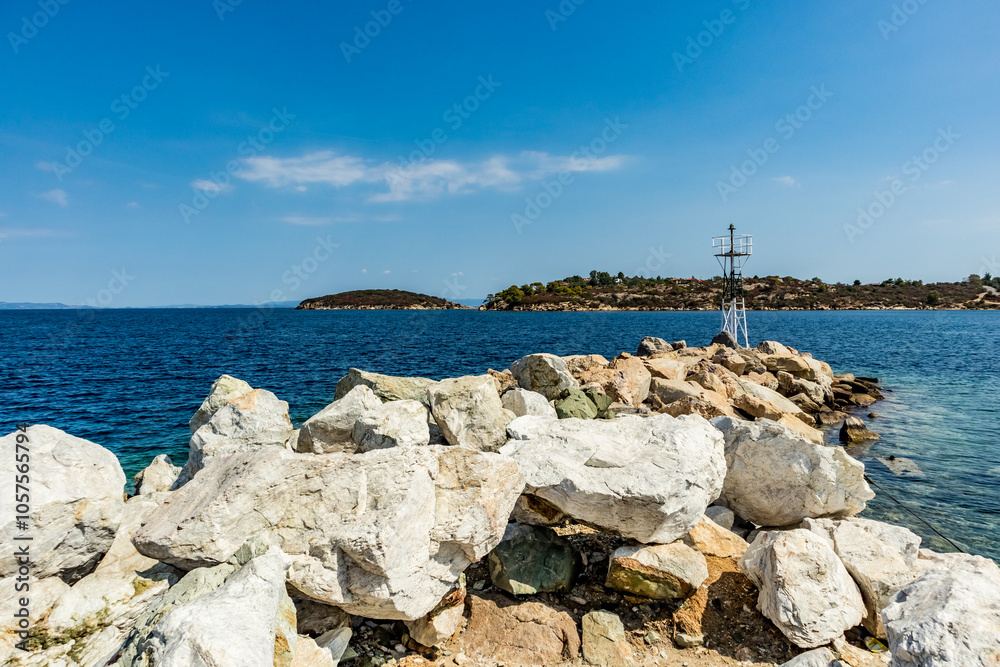Φωτογραφία Small lighthouse on rocky cape, sea and rocks, Sithonia, Khalkidhiki, Greece