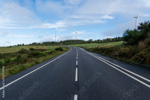 road in the countryside with wind turbines