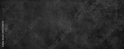 Dark grey textured black grunge concrete wall background