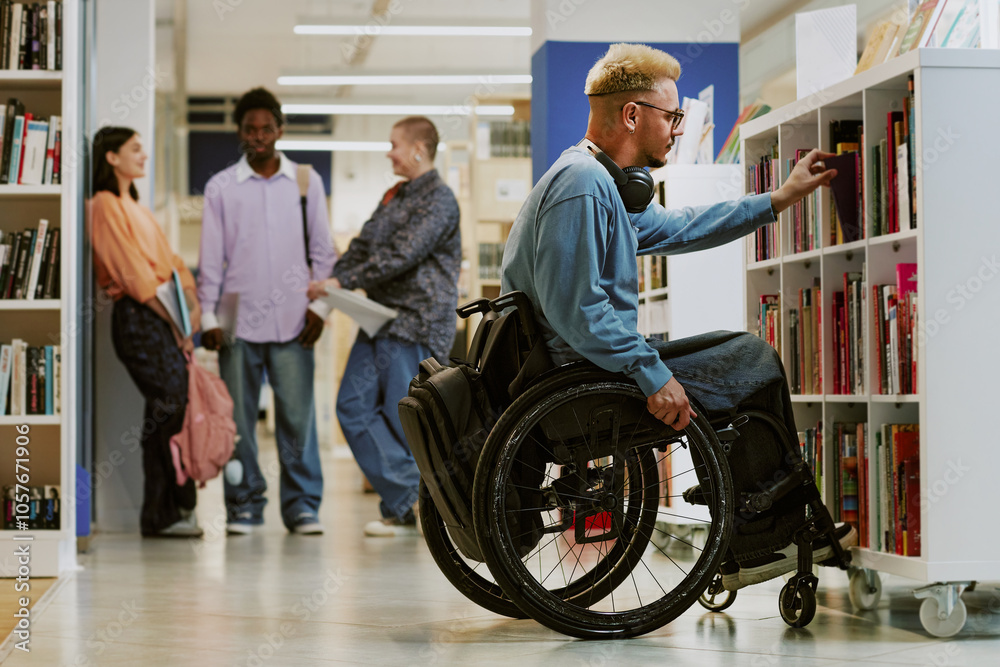 Person in a wheelchair browsing books at a modern library, with diverse group of people engaging in background activities shelving books and discussing literature Person in a wheelchair browsing books at a modern library, with diverse group of people engaging in background activities shelving books and discussing literature