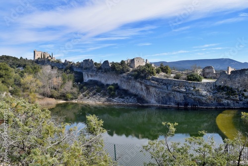 Old monastery site with ruins, arches on a hill in Saint Saturnin Les Apt in France photo