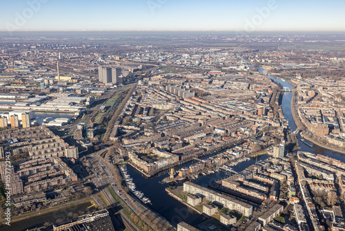 Aerial view Dutch city Rotterdam with residential area and canals