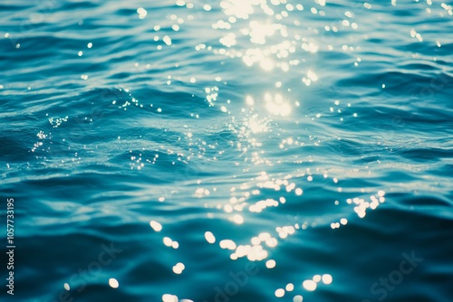 Sunlight sparkling on calm ocean waves in a tranquil seascape