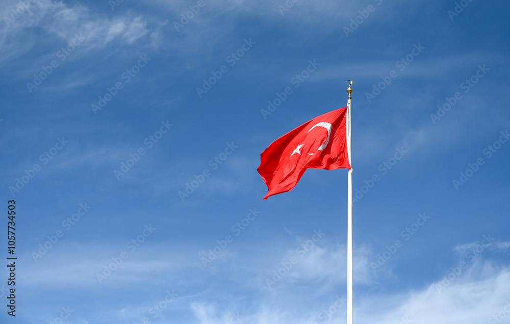 Turkish flag waving in the wind. National flag of Turkey. State and national symbol. Red flag with white star and crescent. Türkiye. Turkish flag waving in the wind. National flag of Turkey. State and national symbol. Red flag with white star and crescent. Türkiye.