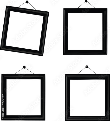 Four Black Picture Frames Hanging On White Wall