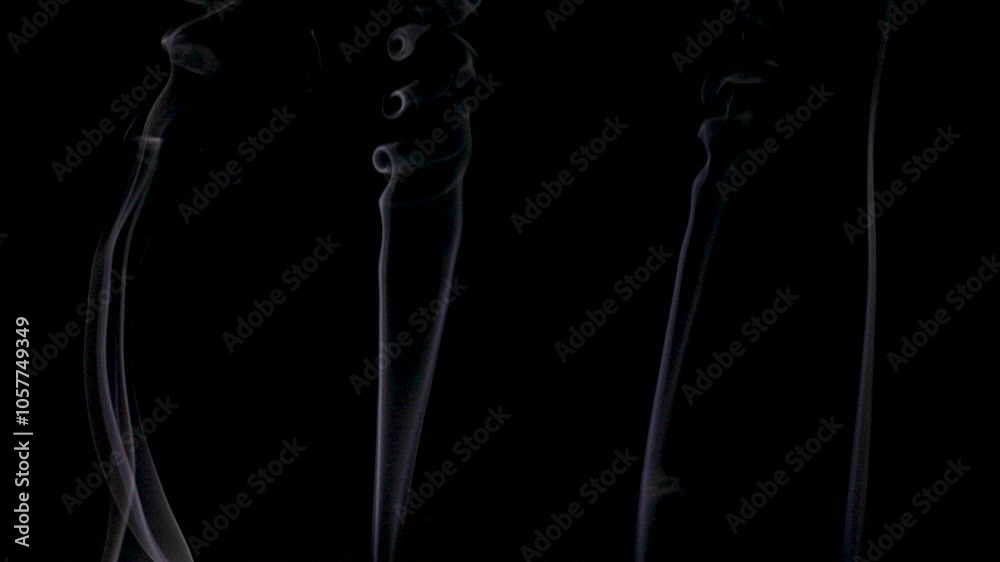 Isolated smoke texture on dark background. Isolated smoke texture on dark background.
