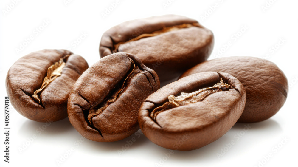 Obraz premium Brown roasted coffee beans isolated on a white background, perfect for coffee-related designs