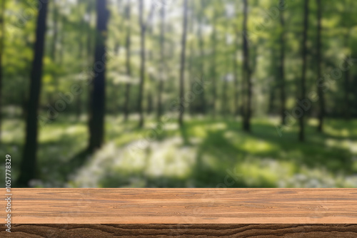 Empty wood table top with blur background of nature lush green forest. The table giving copy space for placing advertising product on the table a long with beautiful green forest nature background.